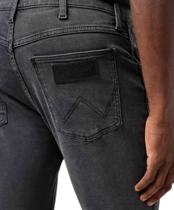 Wrangler Larston Jeans Slim Tapered in grauem Used-Look